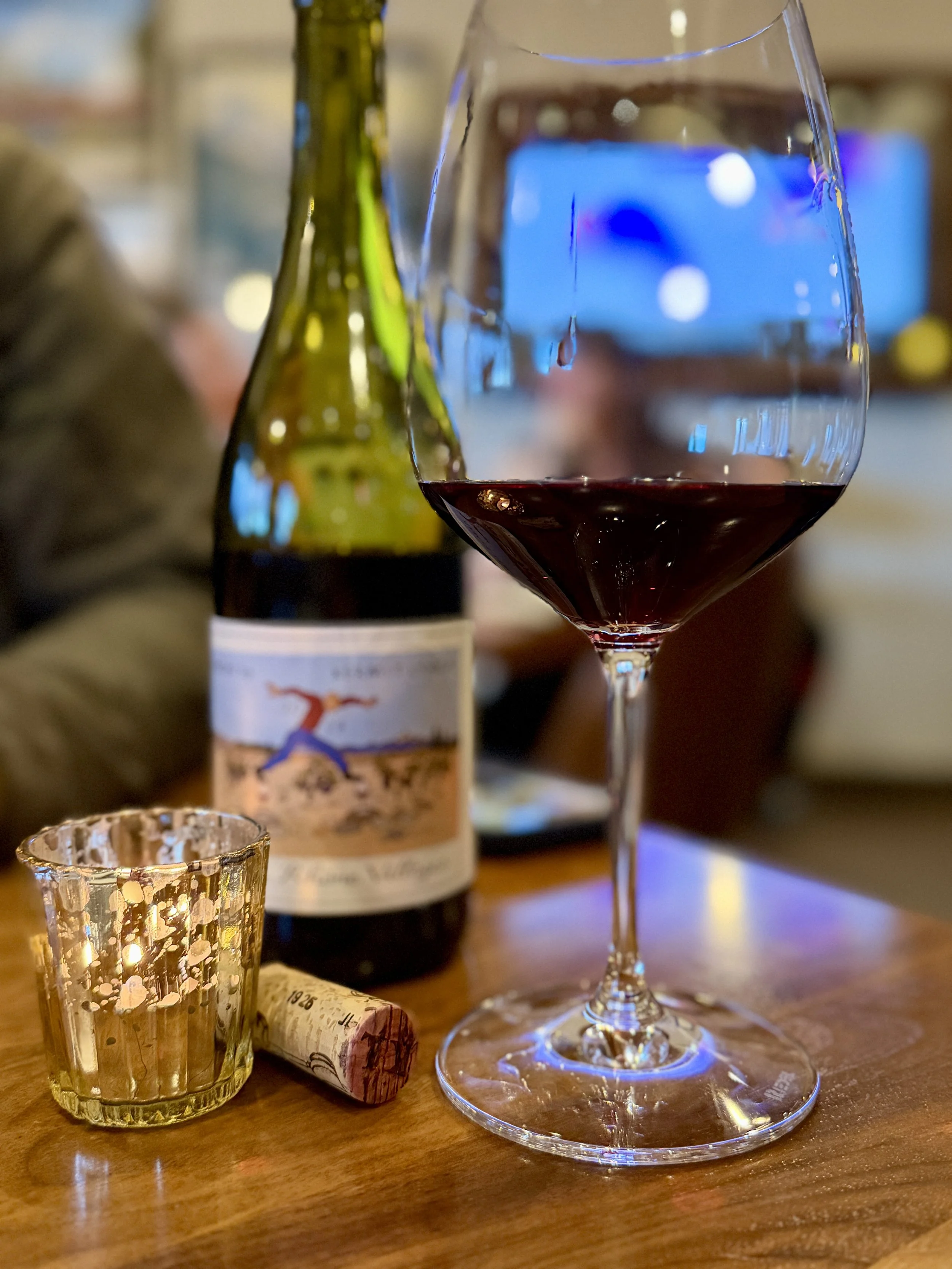 an image of a wine bottle and glass at Babcock & Miles