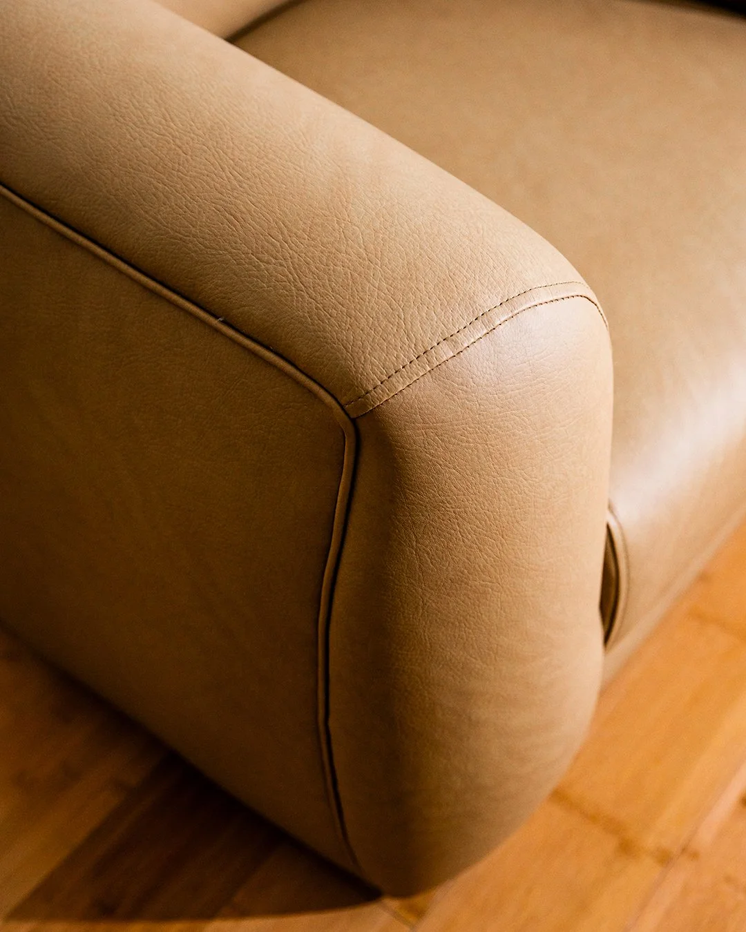 web-brown-armchair-custom-curved-2025.09.03_FortnerFinishedRoom_Selects-10.jpg