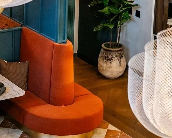 web_Fortner-Multi-Family_Furniture-Velvet-Deco-Curved-Booth-Seating-2025.10.16_FortnerRambler_SelectsFloor1-91.jpg