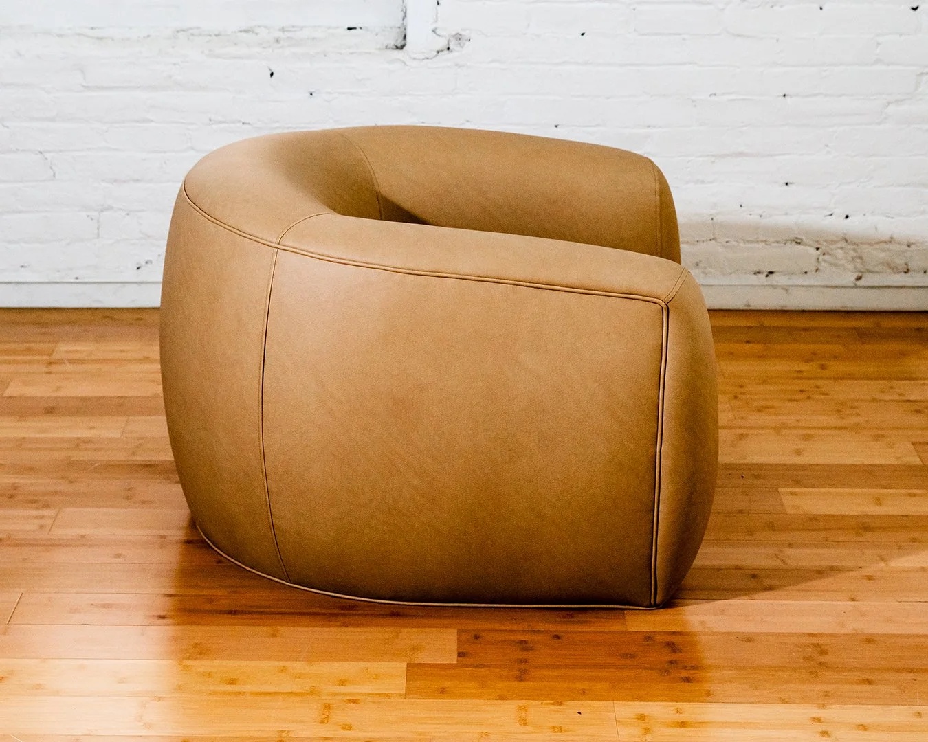 web-brown-armchair-custom-curved-2025.09.03_FortnerFinishedRoom_Selects-23.jpg