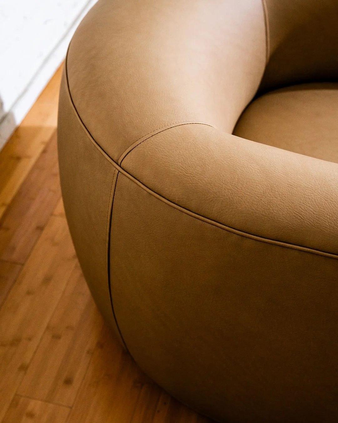 web-brown-armchair-custom-curved-2025.09.03_FortnerFinishedRoom_Selects-13.jpg