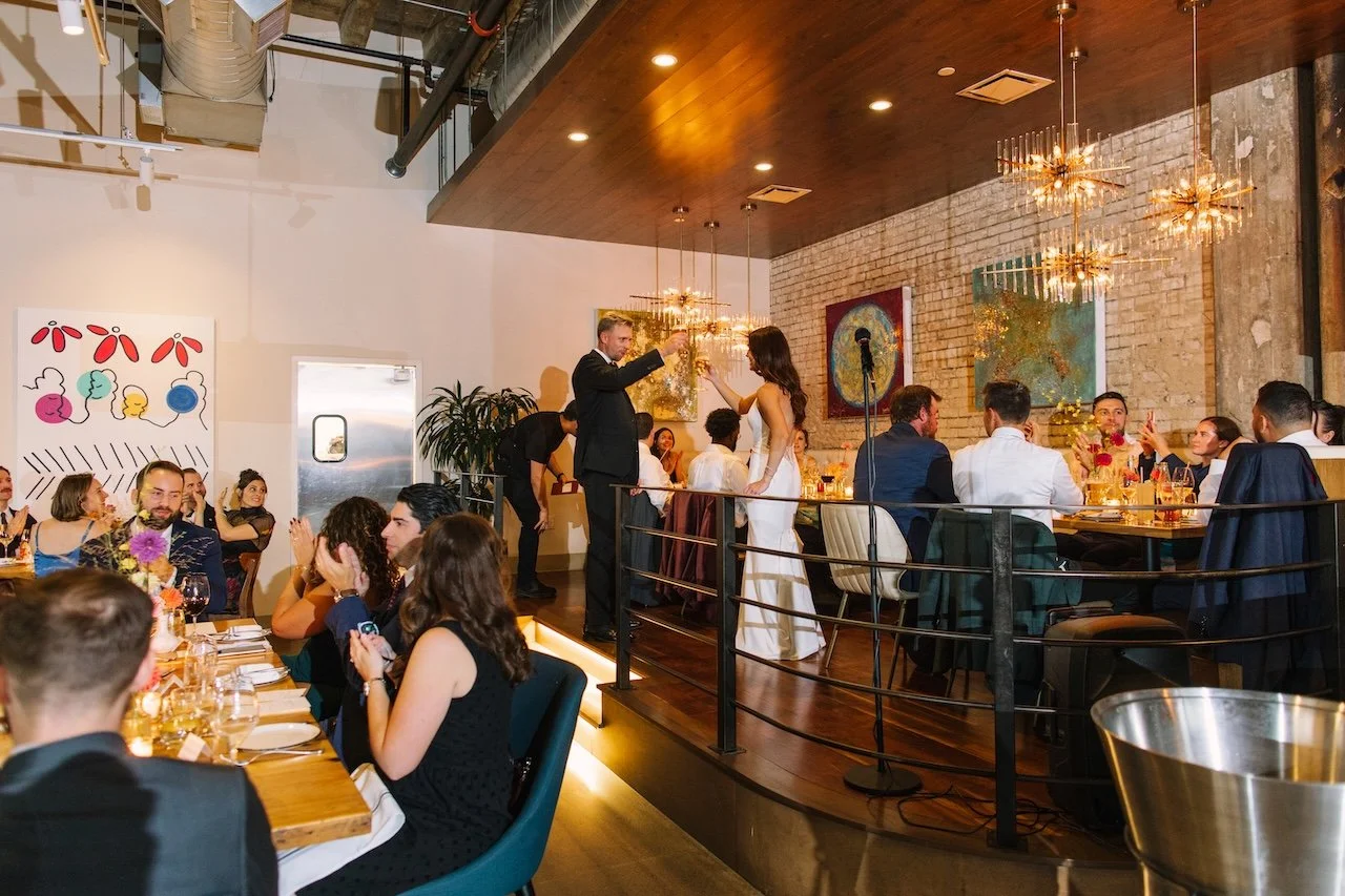 Bride and Groom celebrating their reception at Oak & Reel