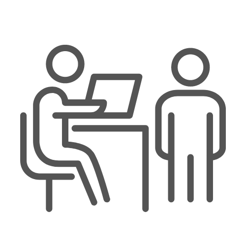 Two people consulting with a laptop