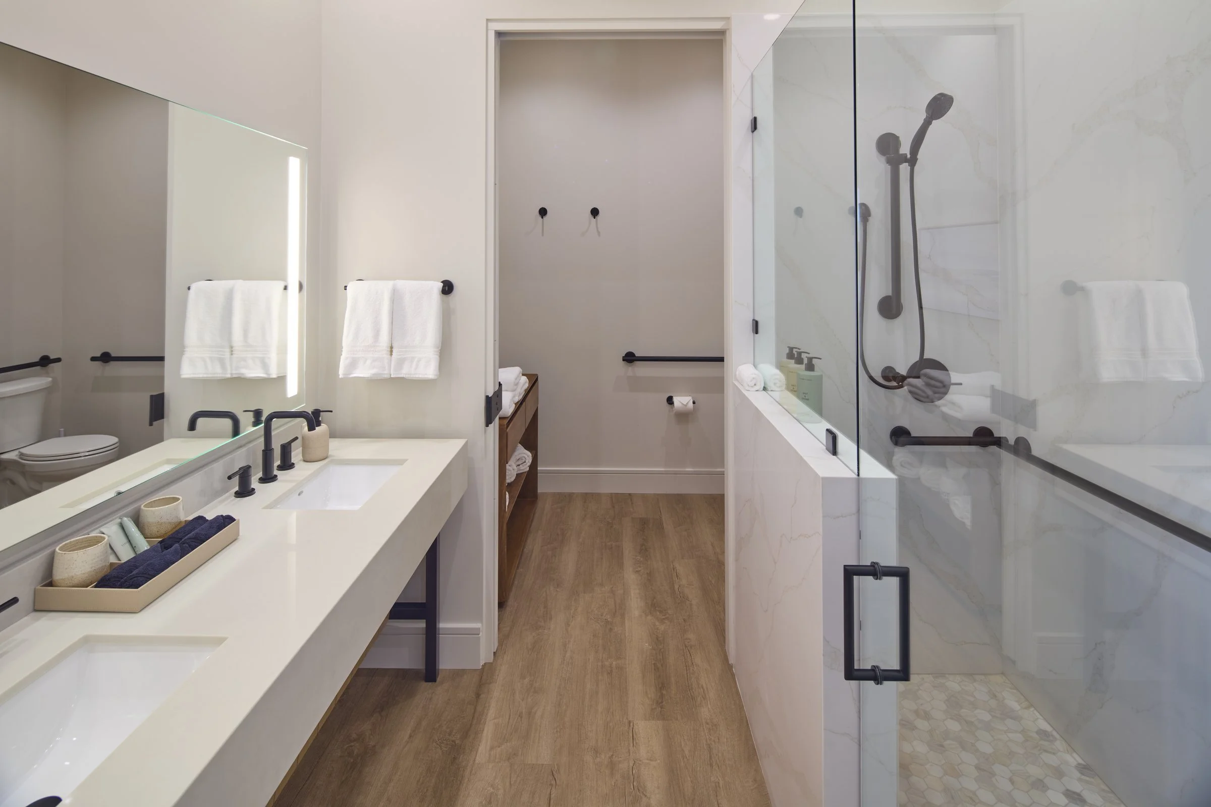 The Overlook Suite step-in shower with floor to ceiling granite surround.