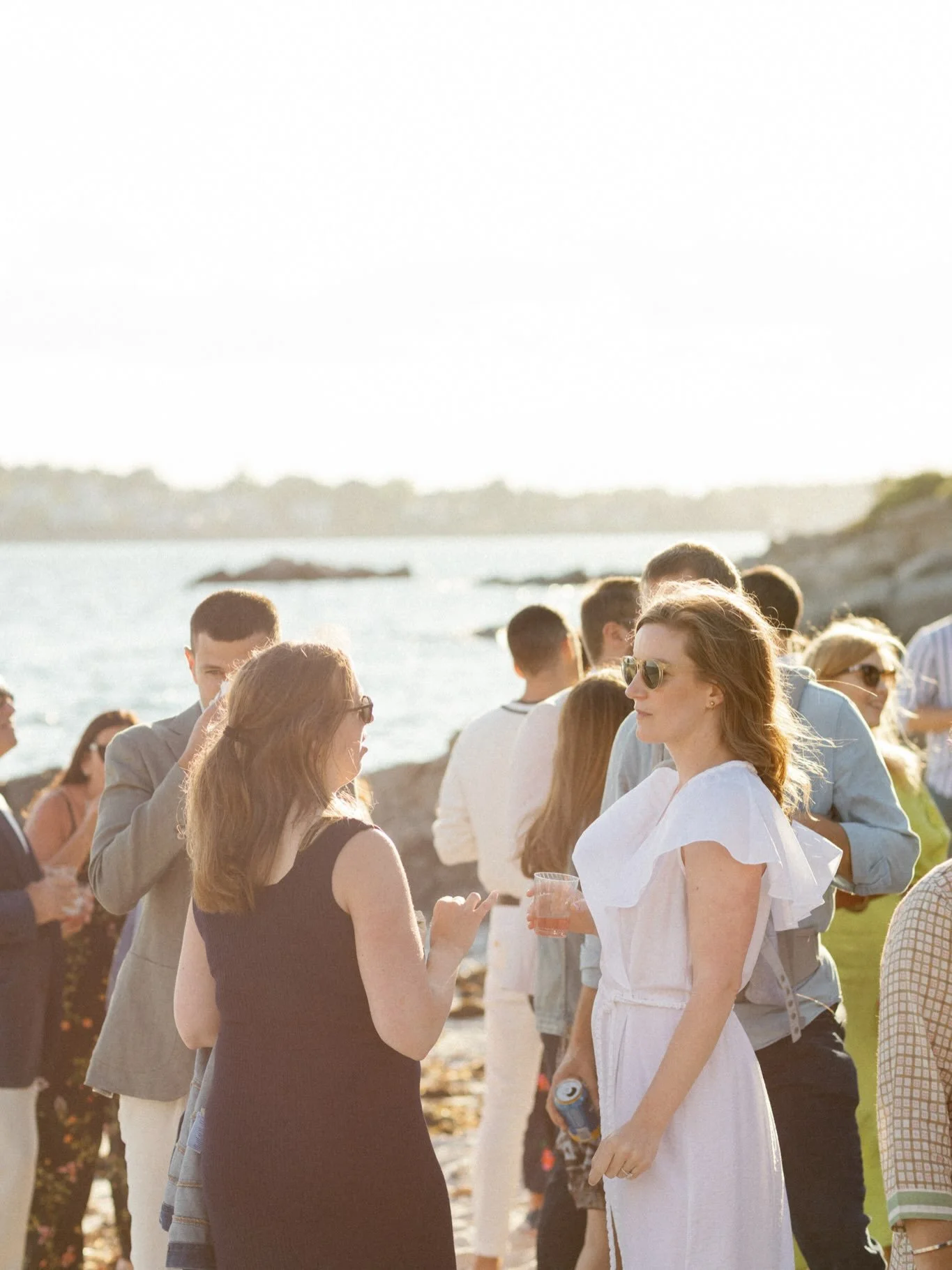 A late Summer island wedding welcome party on the family island.  Bare feet in beach sand.  Lots of hugs.  Cocktail hour.  Taco dinner on the lawn. ✨
