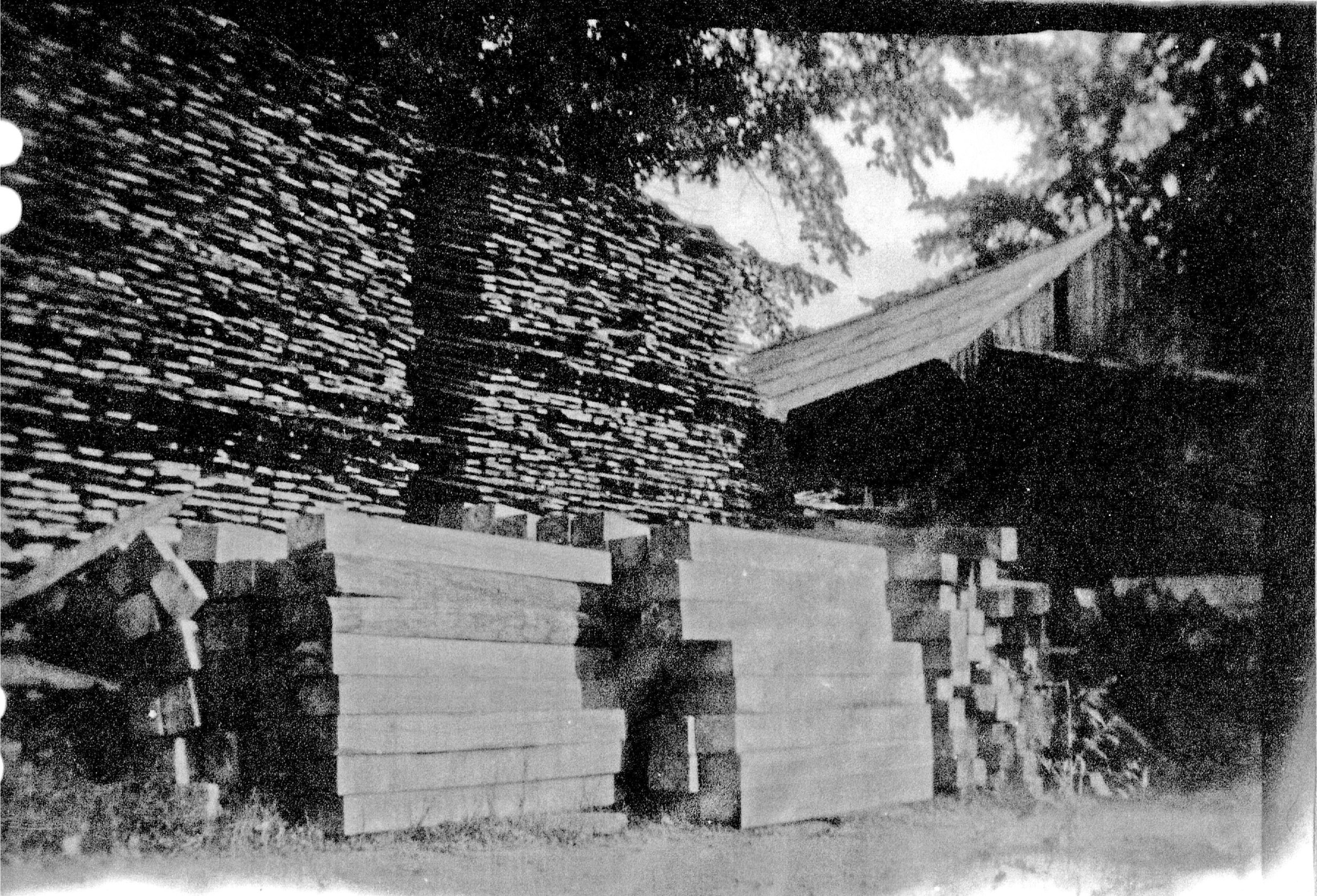 Historic photograph of lumber produced at the Robinson Sawmill.