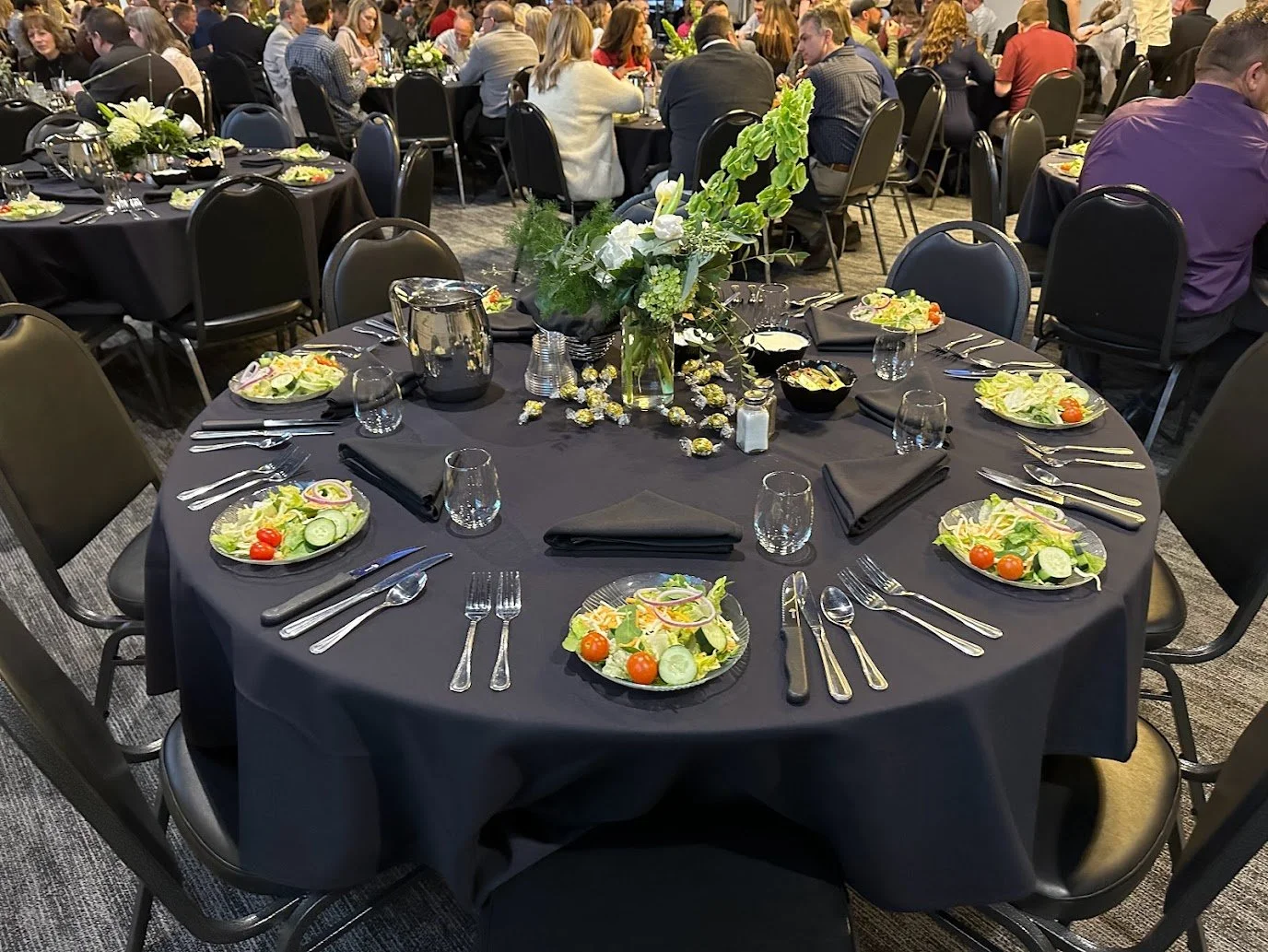 In-house catering providing meals for corporate workshops and conferences at Stadium View Event Halls.
