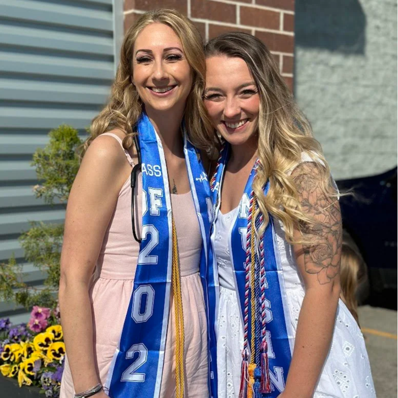 Graduates and guests celebrating together during a graduation party at Stadium View Event Halls.