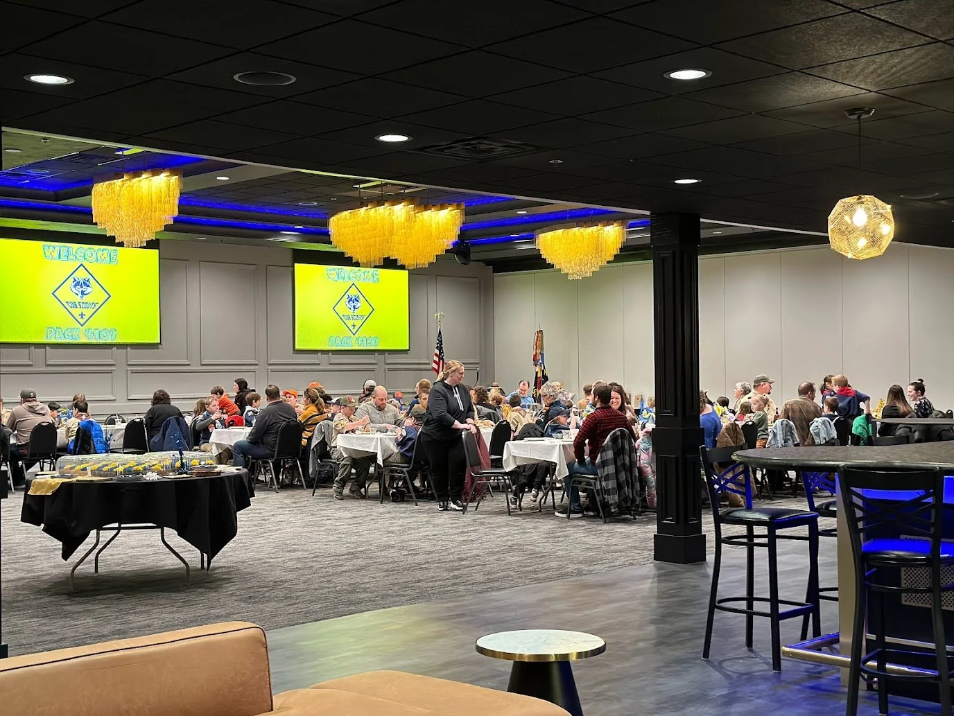 Students and families enjoying dinner during a school celebration at Stadium View Event Halls.