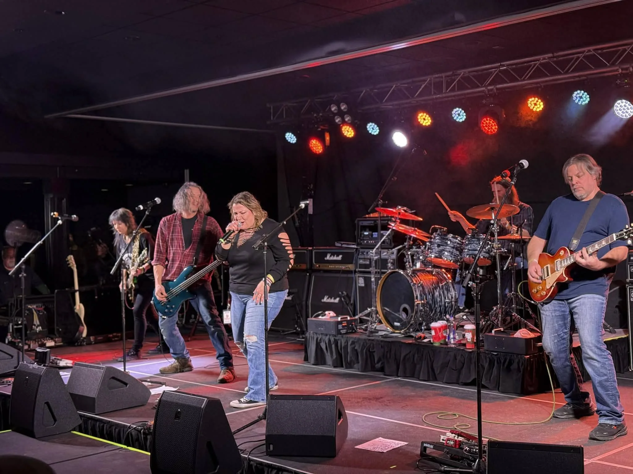 Artists connecting with the crowd during a live music event in Green Bay