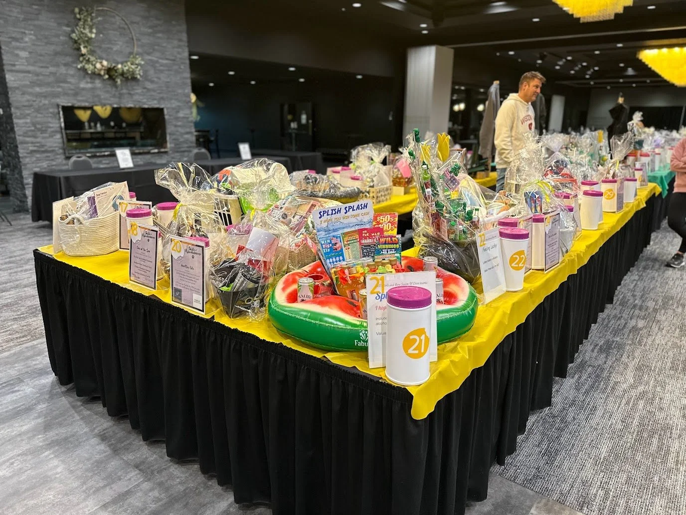 Silent raffle baskets set up for a fundraising event at Stadium View Event Halls.