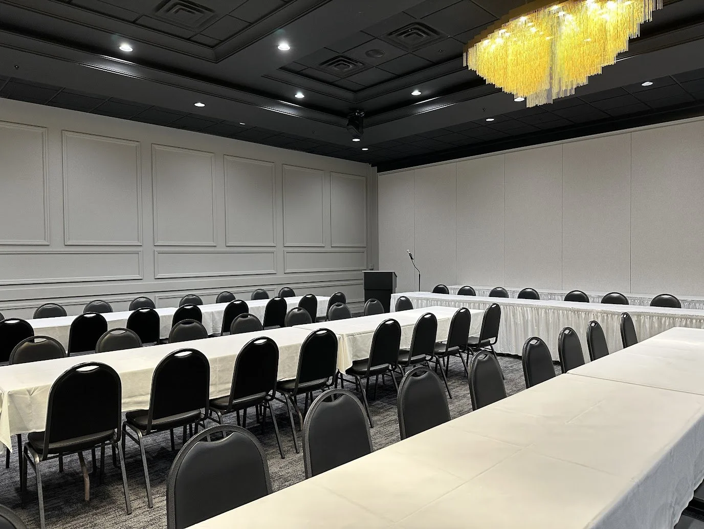 Full corporate event showcasing flexible room layout and professional setup at Stadium View Event Halls.