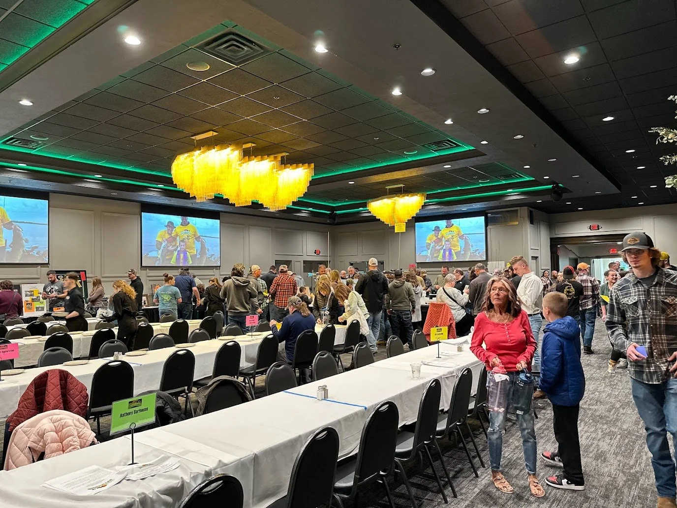 Wide view of a fundraiser event setup at Stadium View Event Halls in Green Bay showing banquet seating and guest tables.