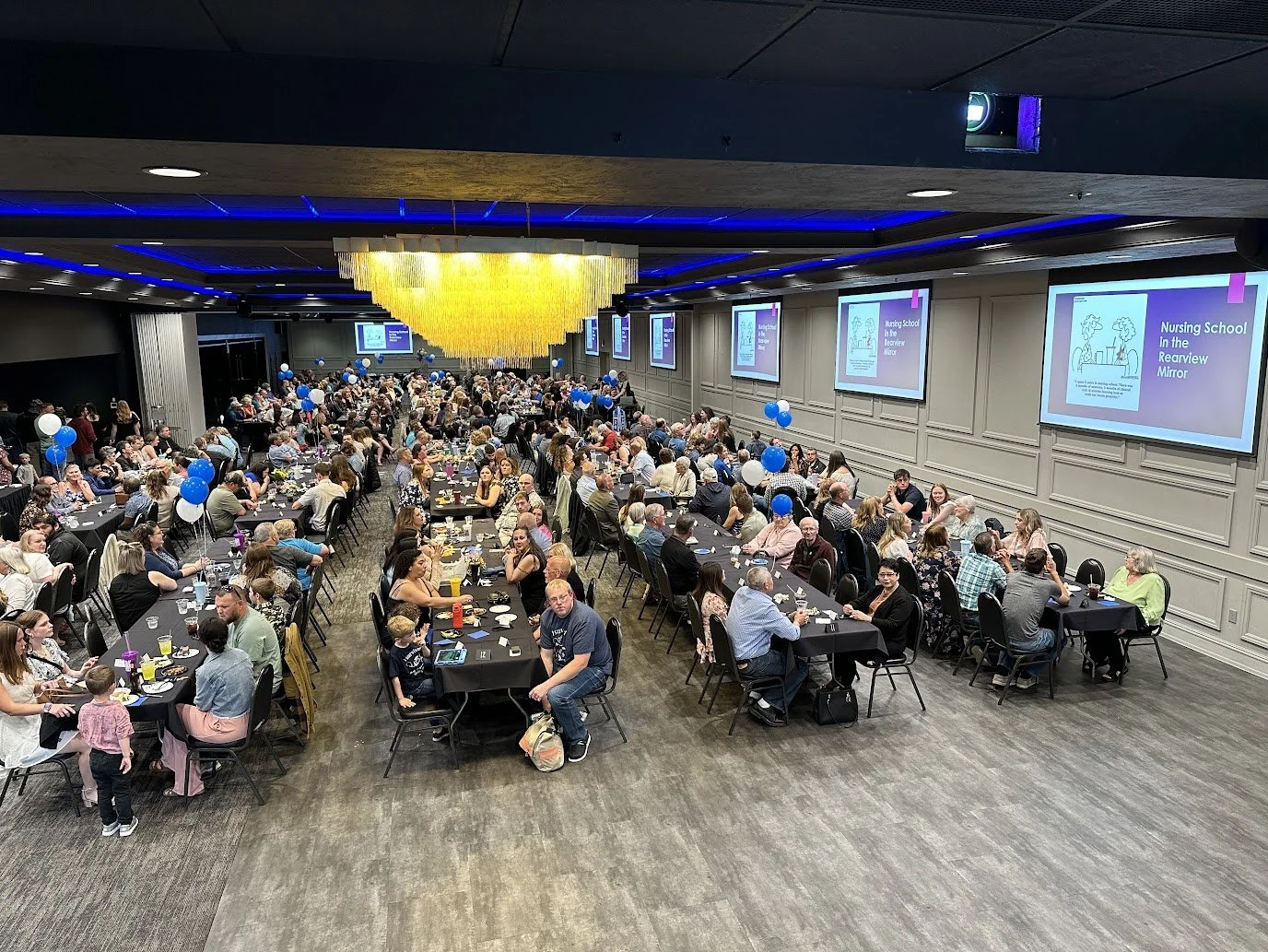Spacious room layout for a graduation ceremony and reception at Stadium View Event Halls.