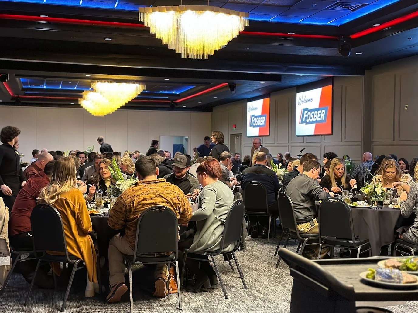 Corporate luncheon with banquet tables and professional setup in Green Bay at Stadium View Event Halls.