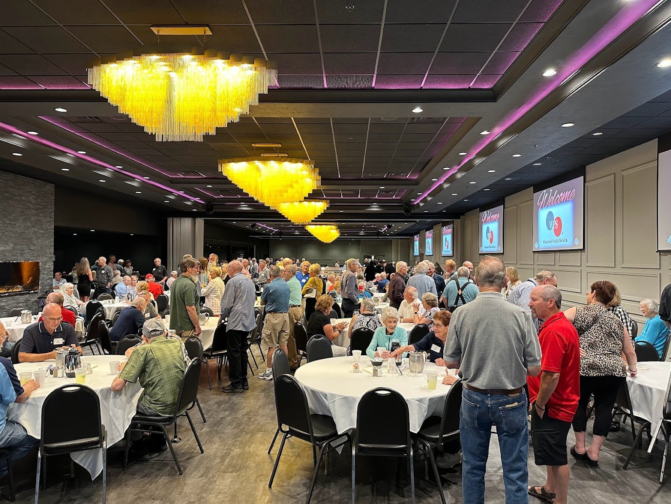 Guests enjoying a dinner banquet in a Green Bay event hall with in-house catering and full-service support.