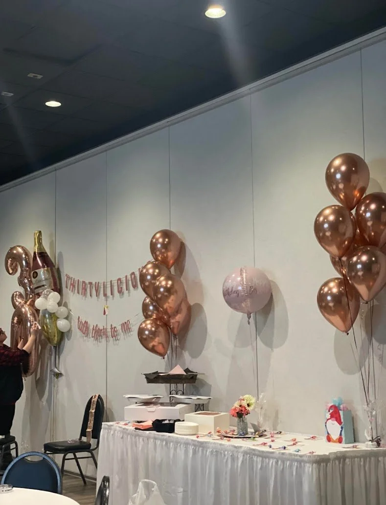 Birthday party atmosphere inside Stadium View Event Halls with guests seated and celebrating.