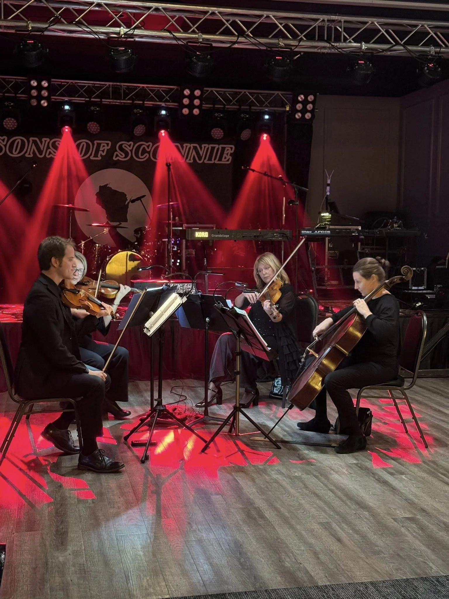 Stage setup ready for a live music performance in the Green Bay stadium district