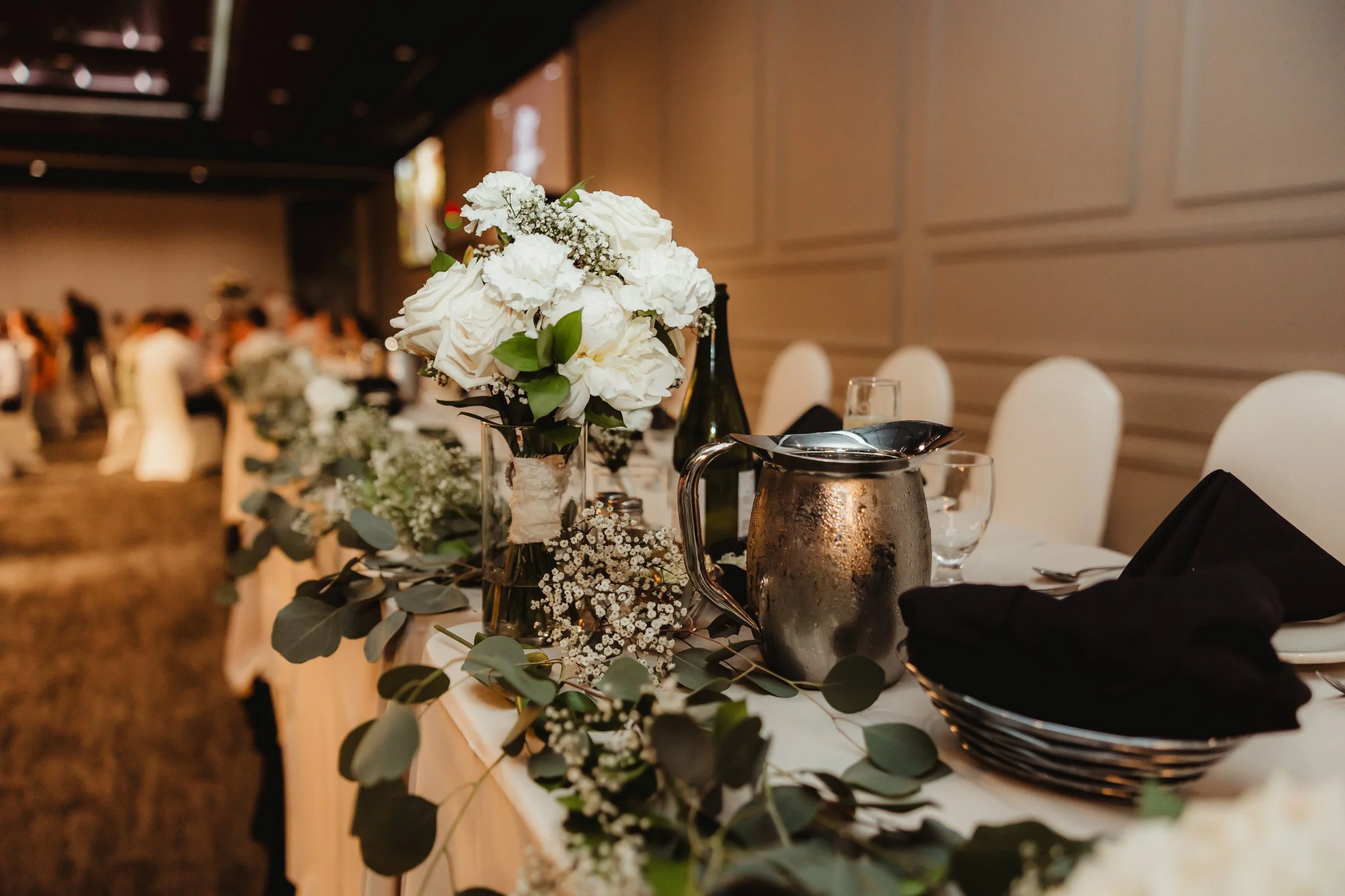 Head table at wedding reception  at Stadium View Event Halls in Green Bay, WI 