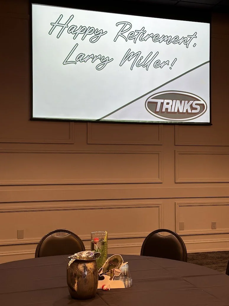 Guests enjoying food and drinks at a retirement party venue
