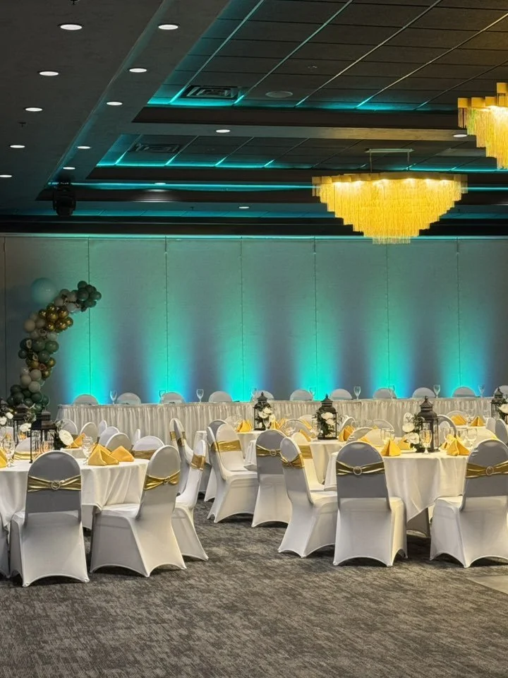 Wide room overview of a Quinceañera reception hosted at Stadium View Event Halls near Lambeau Field.