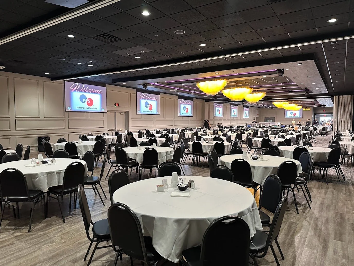 Corporate meeting setup at Stadium View Event Halls in Green Bay with boardroom-style seating and presentation area.