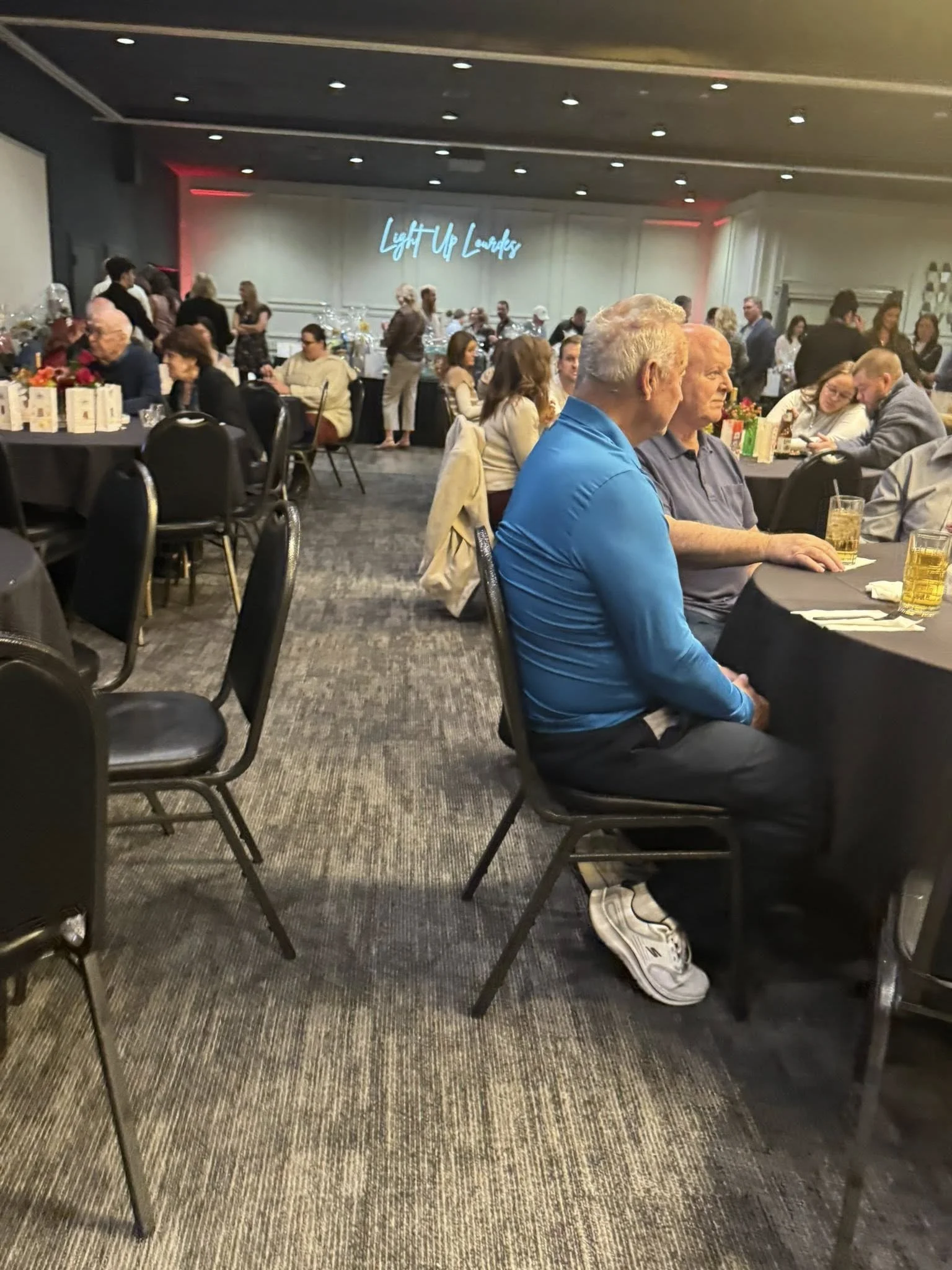 Students, families, and faculty celebrating at a school function in Green Bay at Stadium View Event Halls.