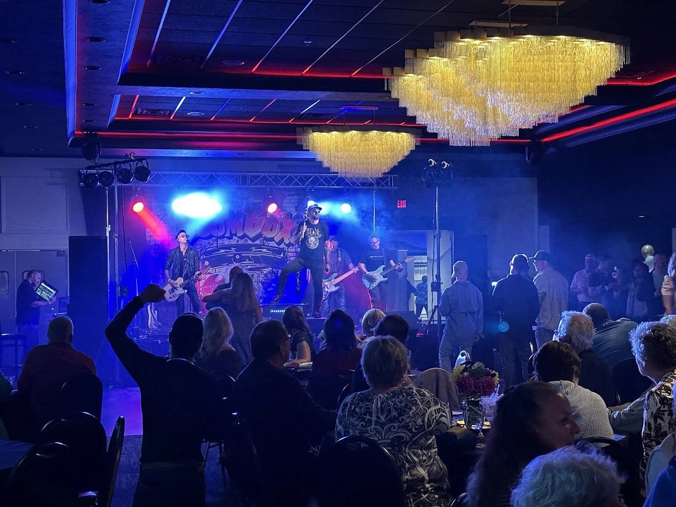 A packed crowd enjoying a live concert at Stadium View Event Halls in Green Bay