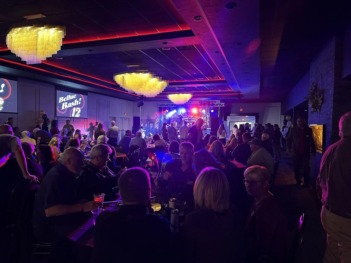 Guests enjoying drinks during a live concert at Stadium View Event Halls