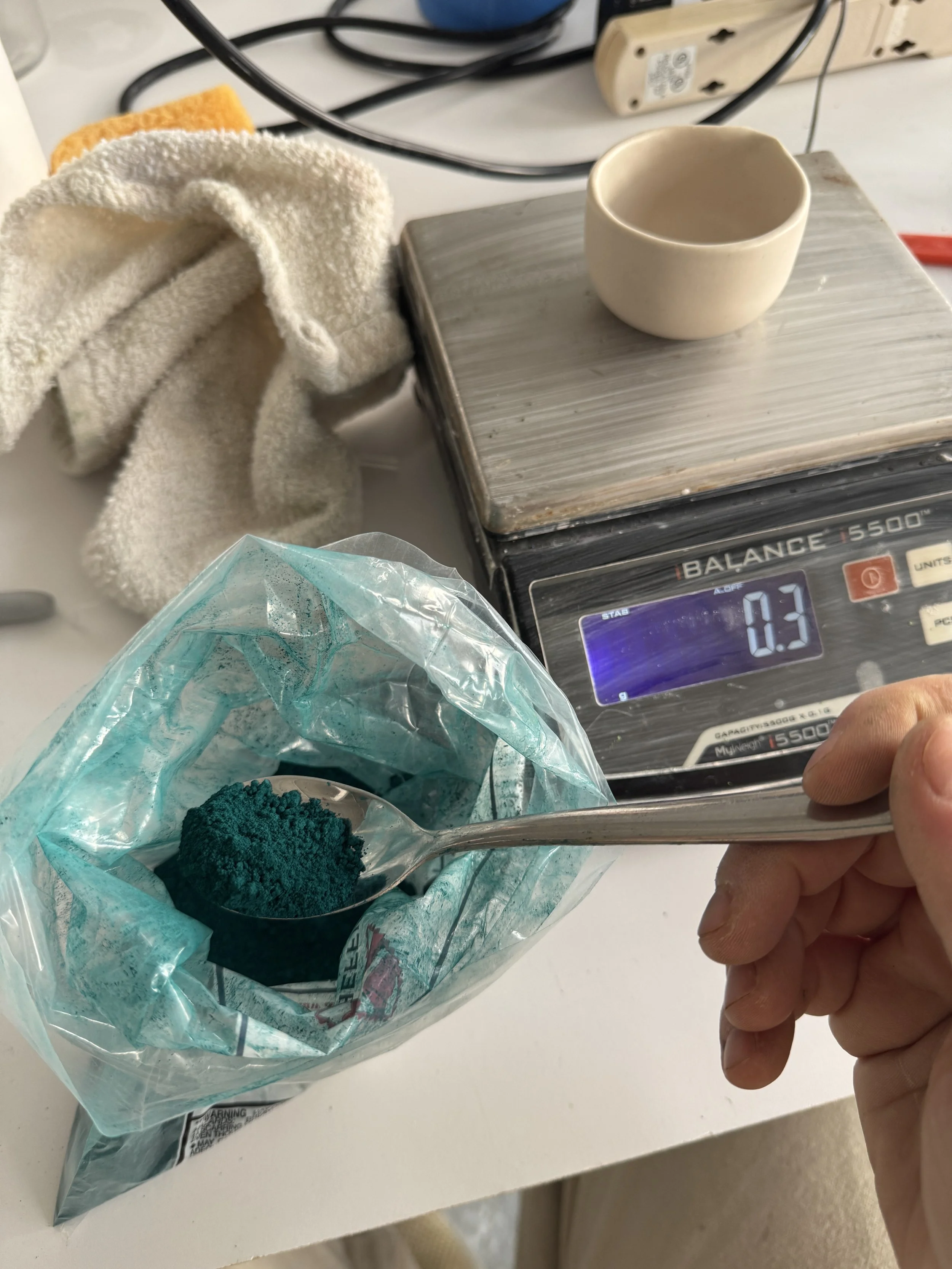 Measuring pigments to the 0.1 gram.