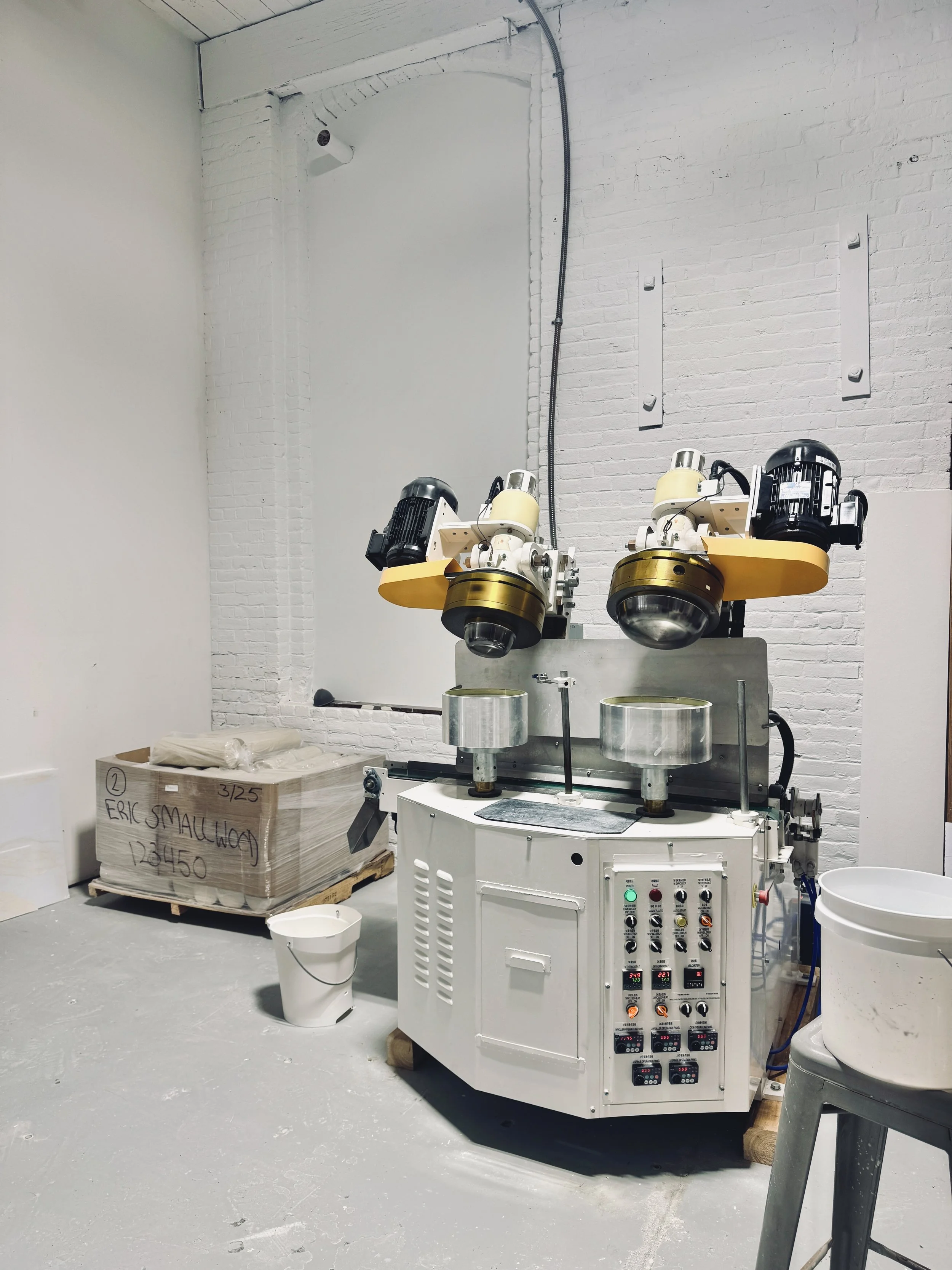 The roller jigger and our new custom porcelain clay. 