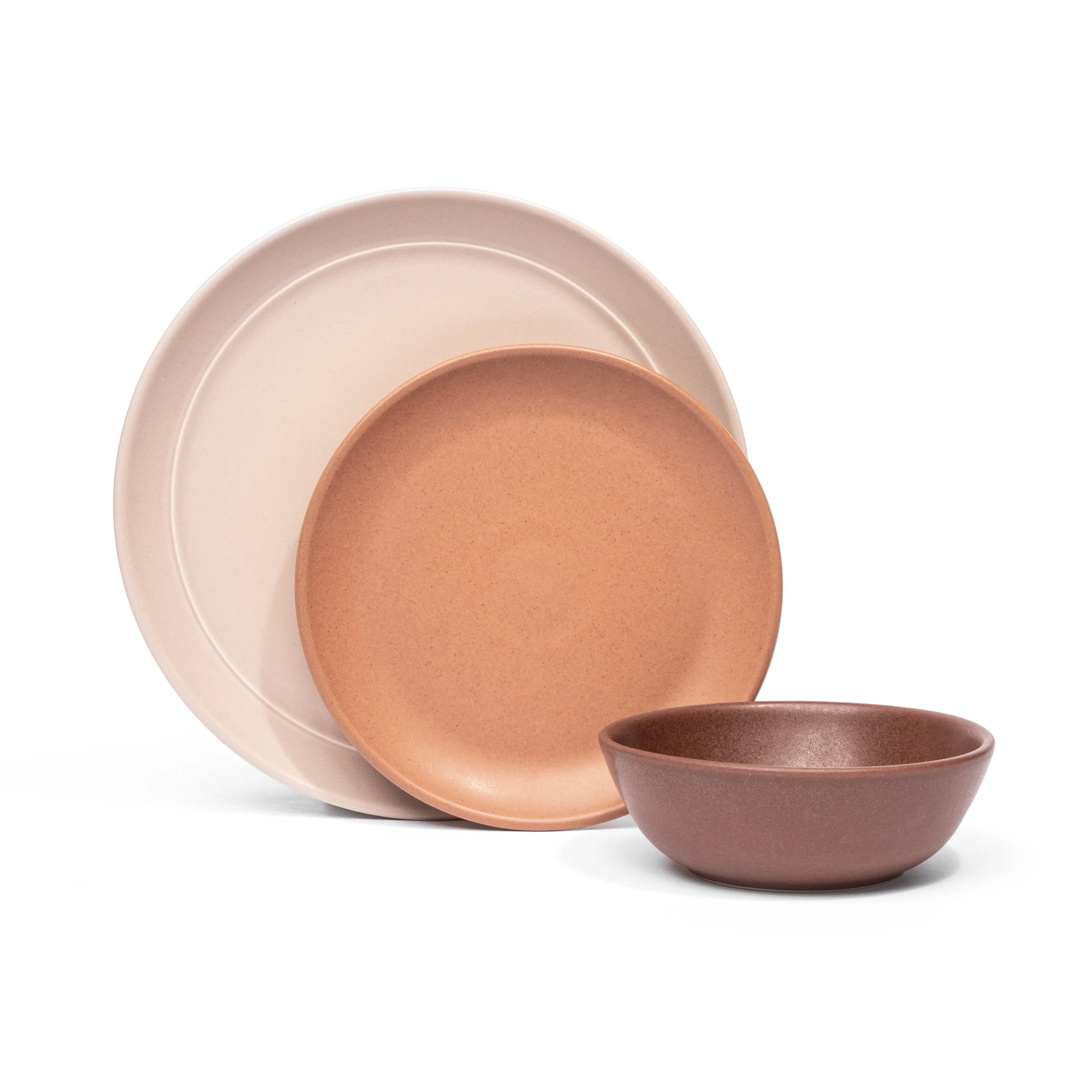 Myrth place setting mixing glazes by form, Nightfall dinner and appetizer plates with a Dove tasting bowl.