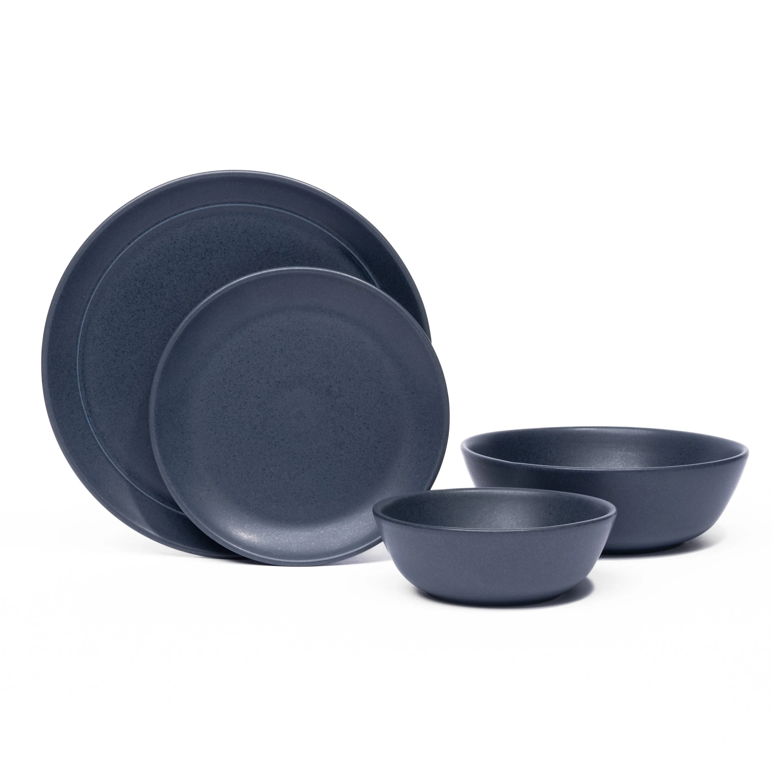 Myrth porcelain place setting in Nightfall, dinner plate, appetizer plate, and tasting bowl all in one glaze.