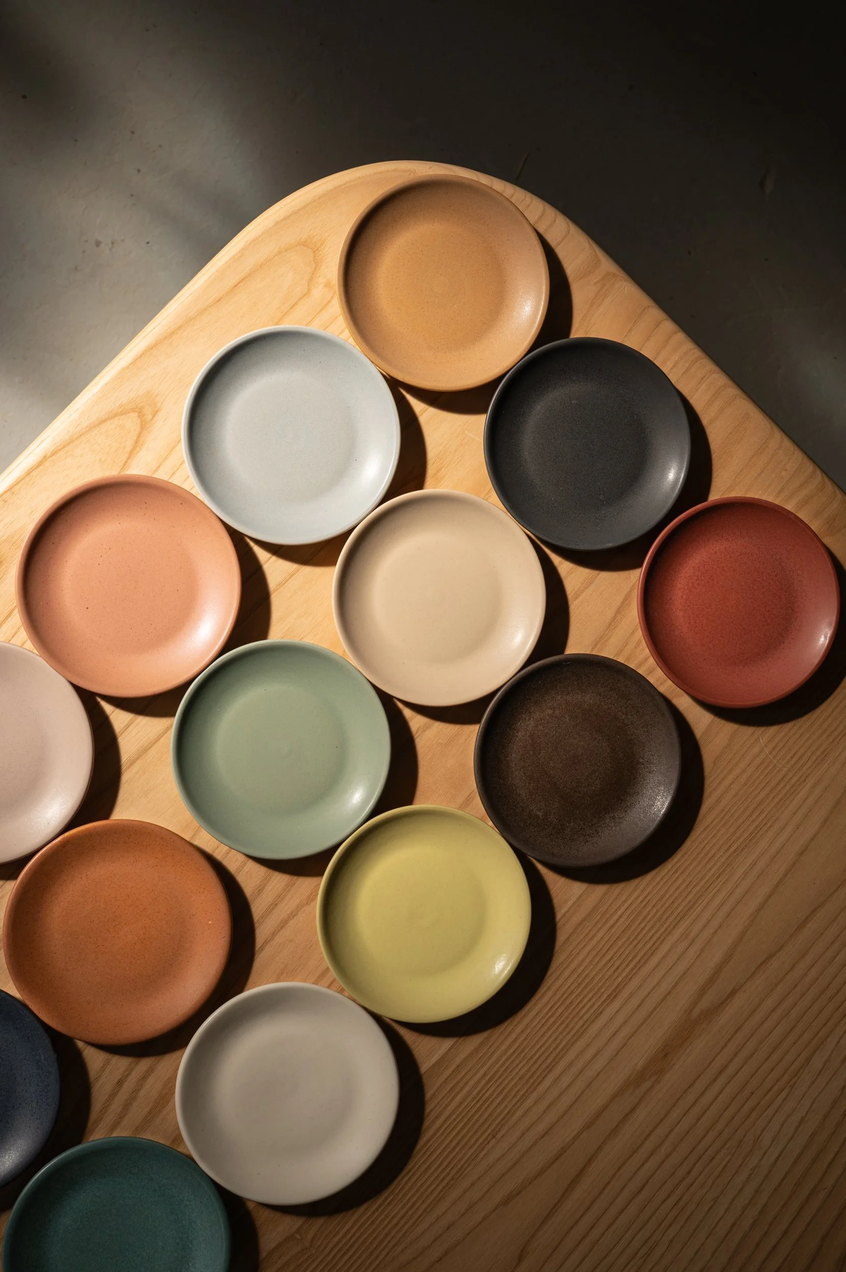 Full hospitality glaze collection in Miso, Brine, Char, Shallot, Roux, Brandywine, Agave, Ume, Canyon, Dove, Nightfall, Verdigris, and Rosewood | Myrth Ceramics