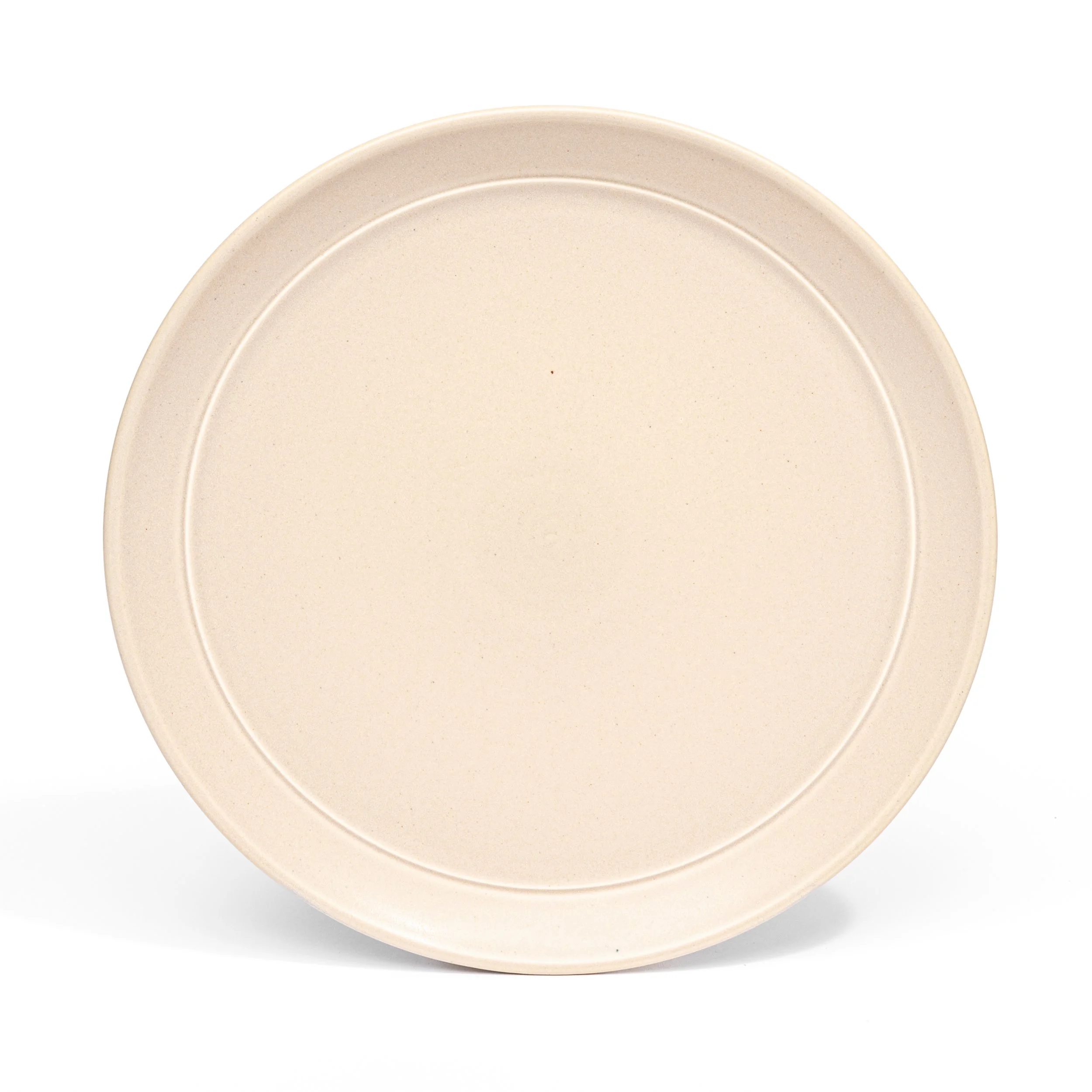 Handcrafted porcelain dinner plate, 10 inch, shown in Roux glaze — Myrth Ceramics
