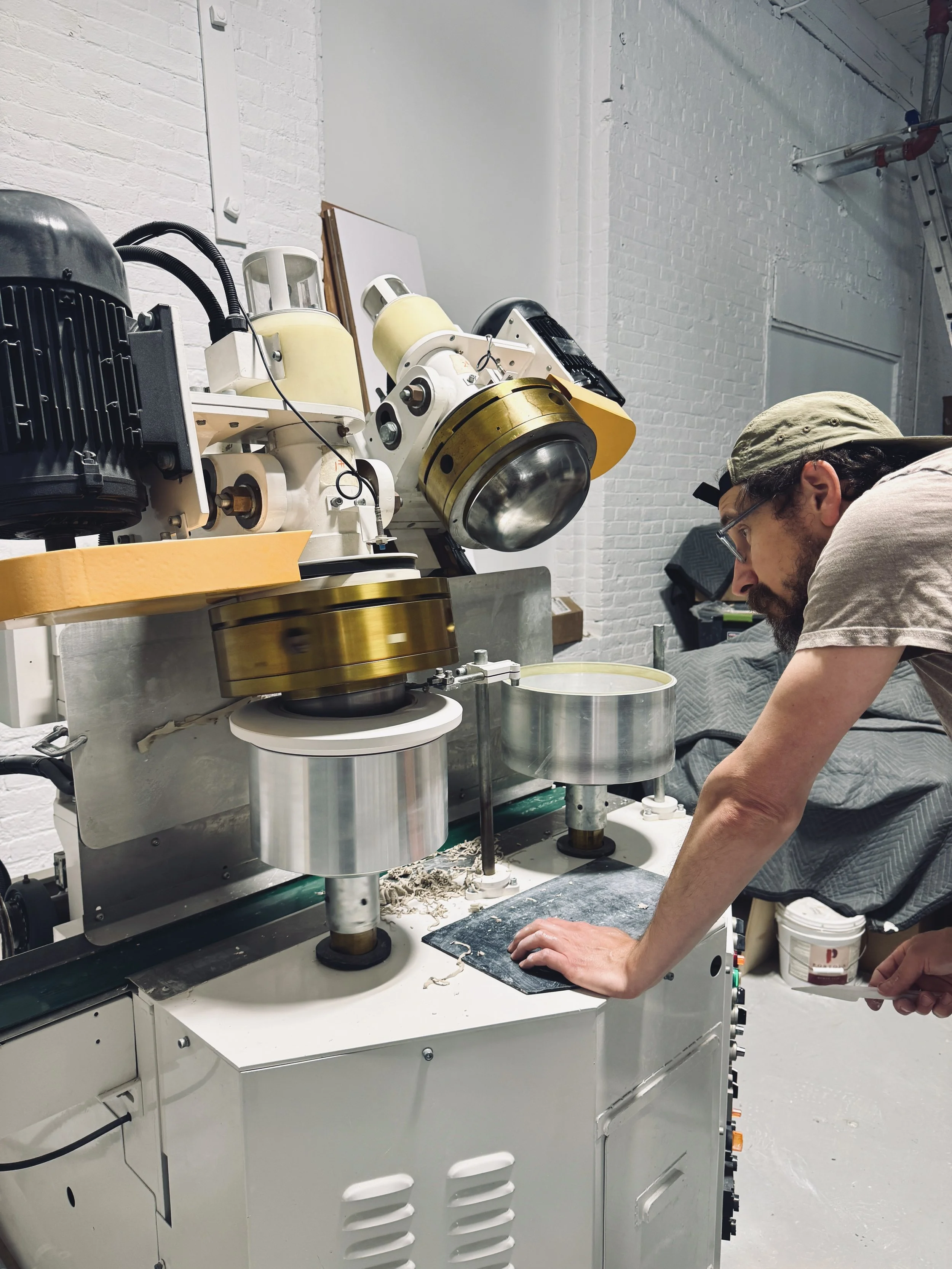 Porcelain appetizer plates being formed on the roller jigger at Myrth's East Providence studio