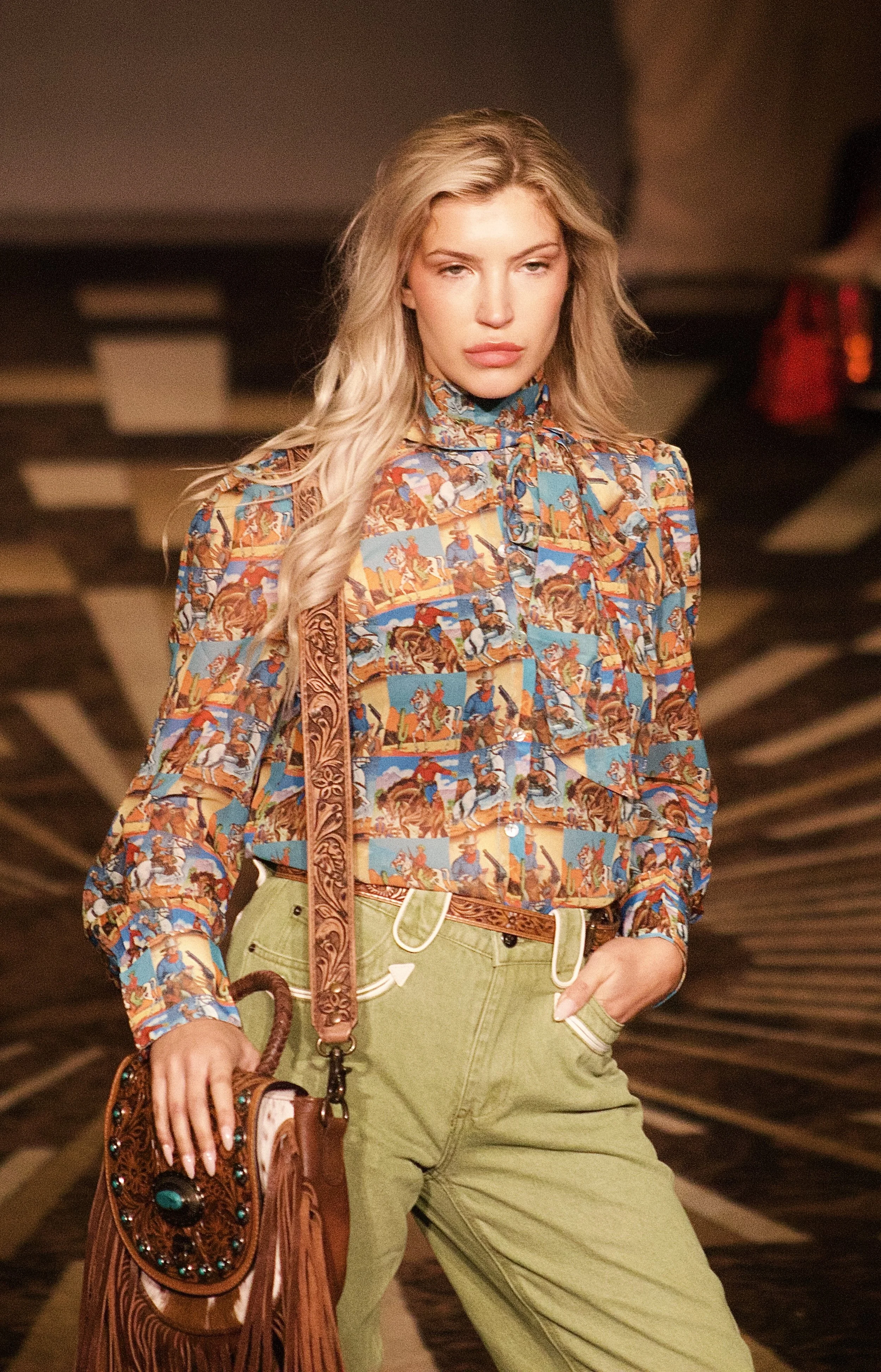 Model wearing vibrant American outfit on runway