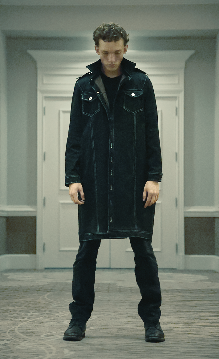 Lookbook shot of boy standing straight showing off VRTY clothing