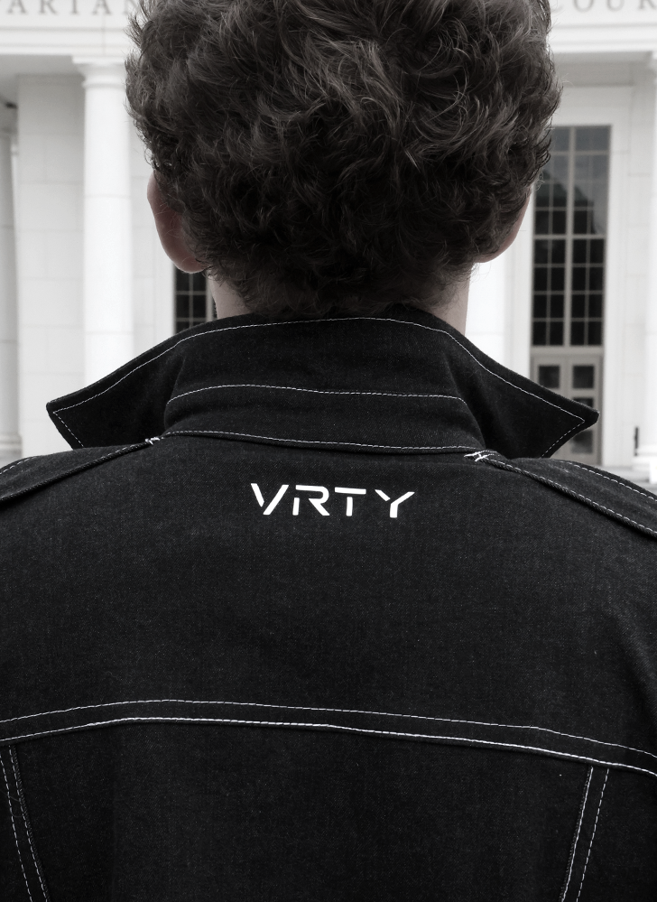 Back view of VRTY clothing showing logo beneath neck