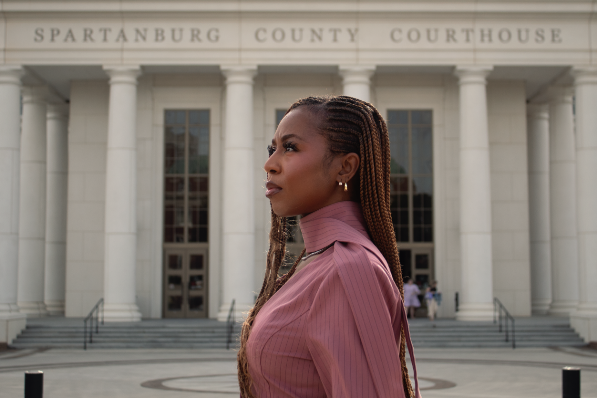 Courtney McClain staring up defiantly