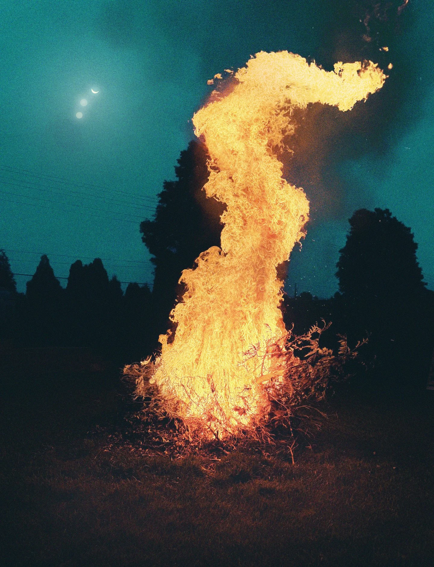 Surreal Sky during blue hour with a fire