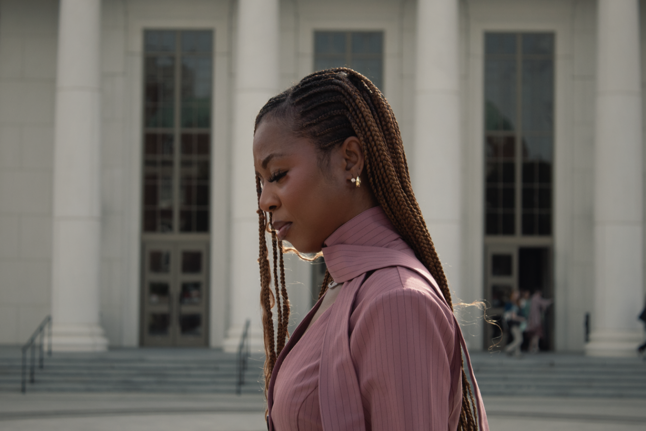 Courtney McClain standing in front of courthouse
