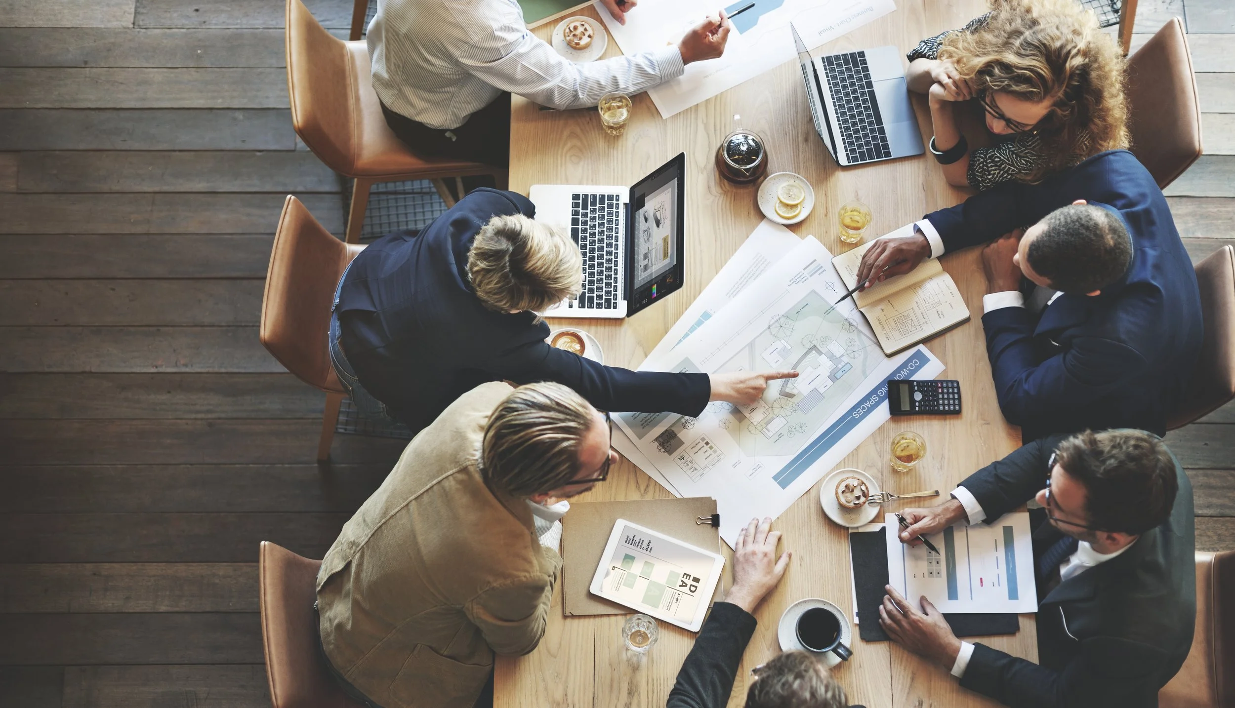 Real estate professionals conducting a transaction