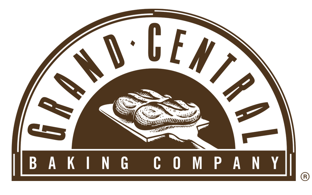 Logos for Garland Central Baking Company with a crocodile illustration in a circle and text.
