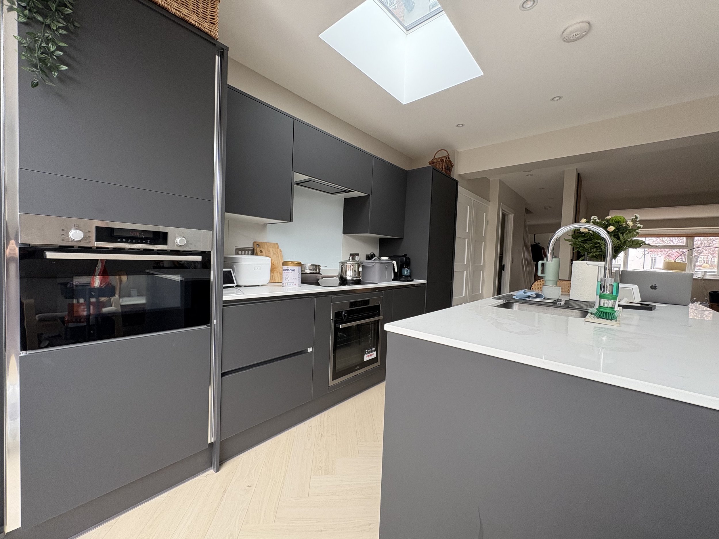 Rooflight above a contemporary graphite kitchen