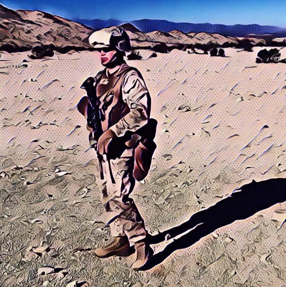 Marine in the field dressed in gear.