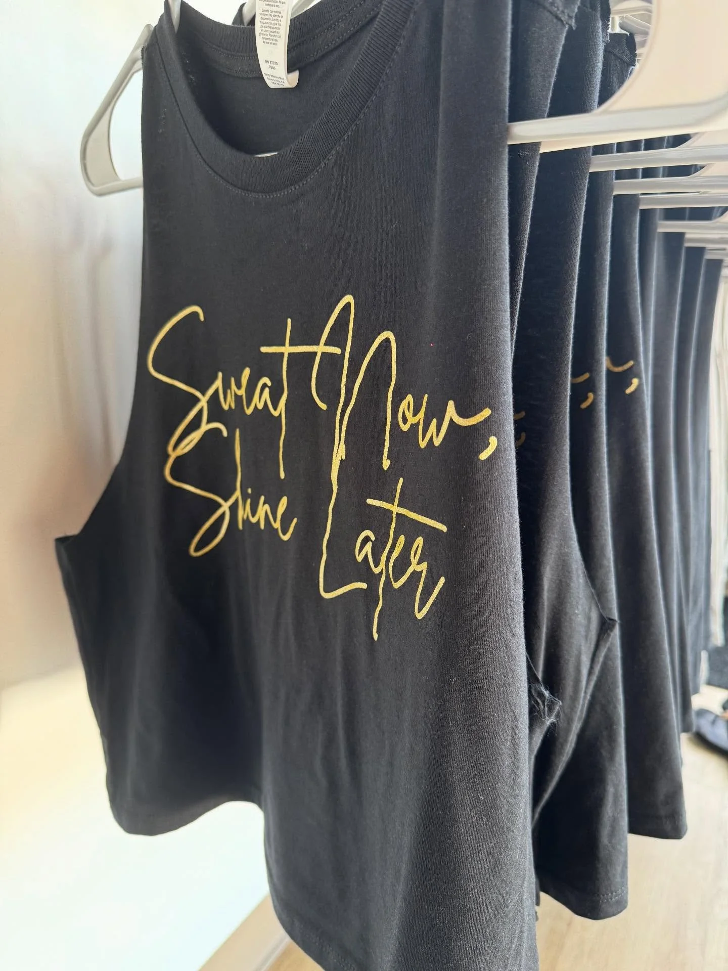 Our Sweat Now, Shine Later tanks just landed. Perfect for hot yoga, HIIT, or anywhere you want to shine. Grab yours before they&rsquo;re gone! ✨💫🖤

#newmerchalert🚨  #attention #newtanks