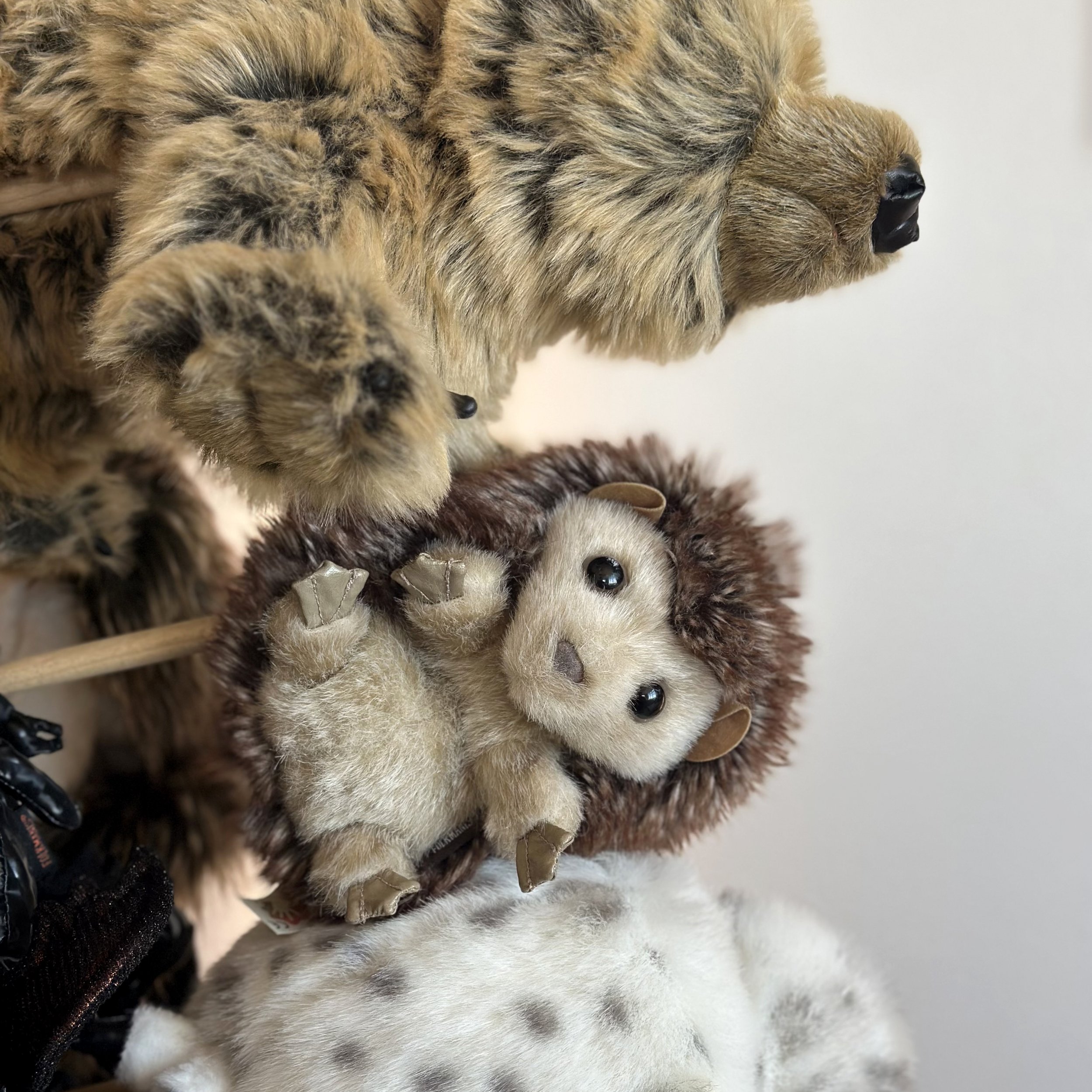 A bear and hedgehog puppet