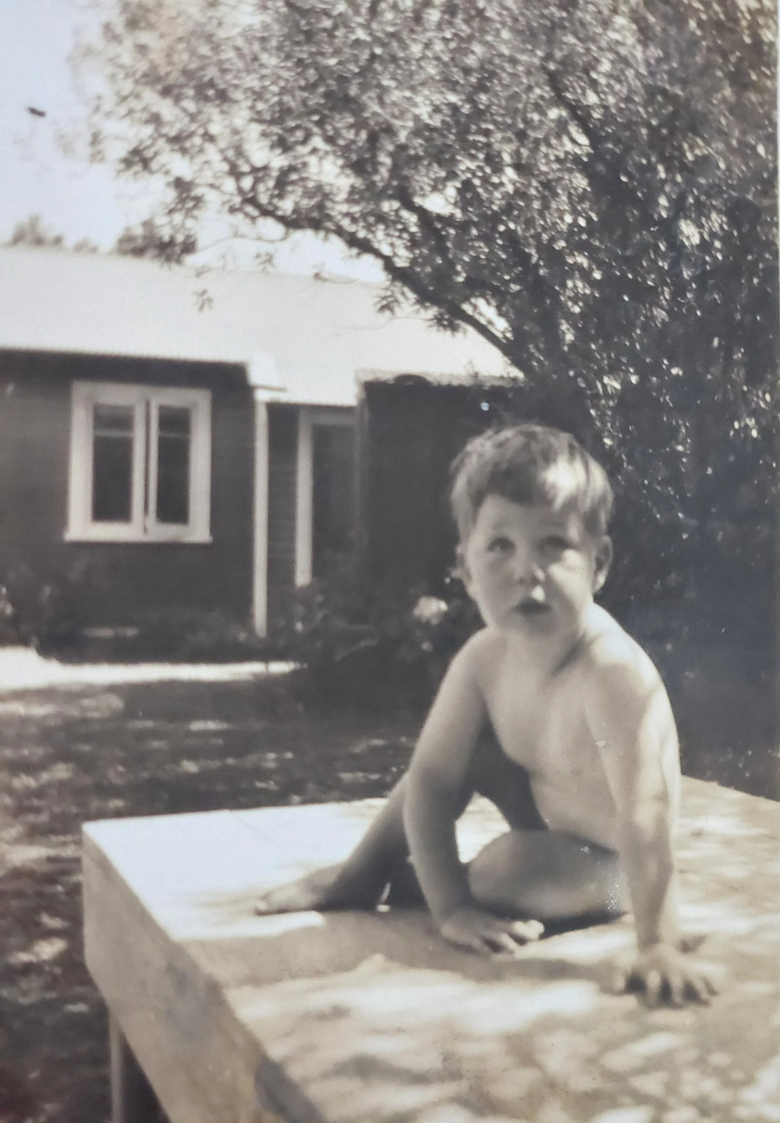 Jeremy as a baby on a visit to Otaki Beach