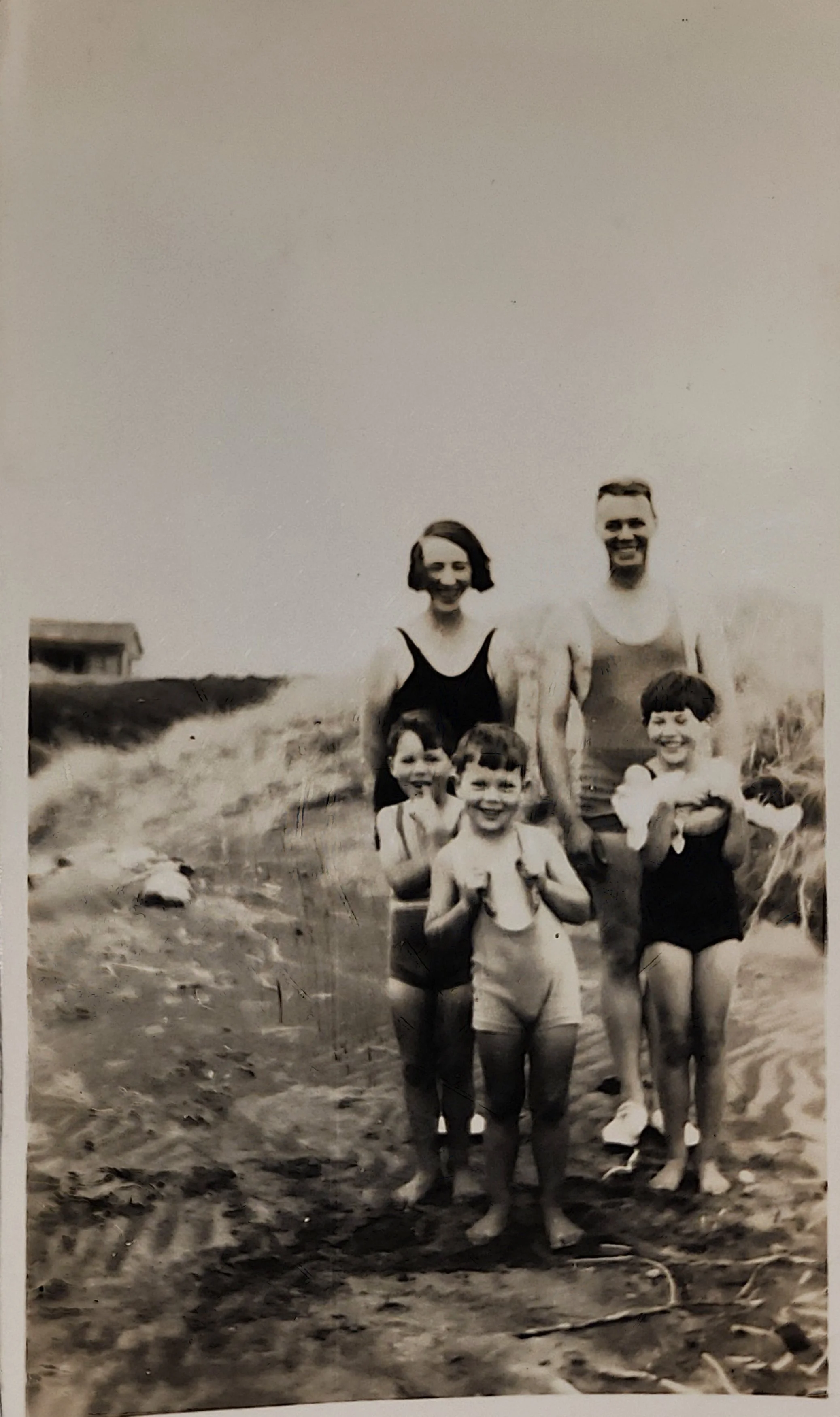 Marly and Bill with children at the beach, circa mid-1930s